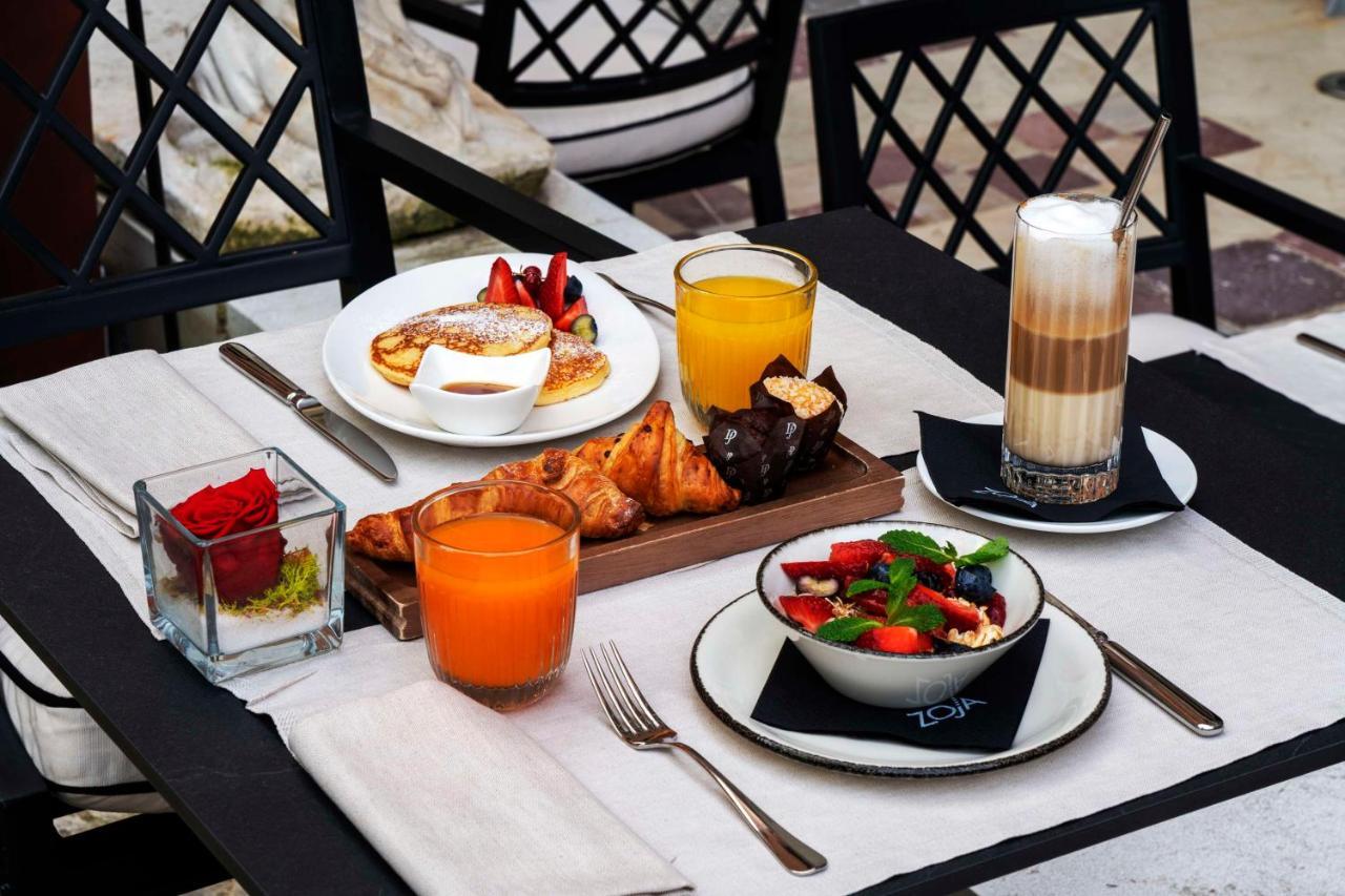 Radisson Collection Hotel, Palazzo Nani Venetië Buitenkant foto Breakfast at the hotel